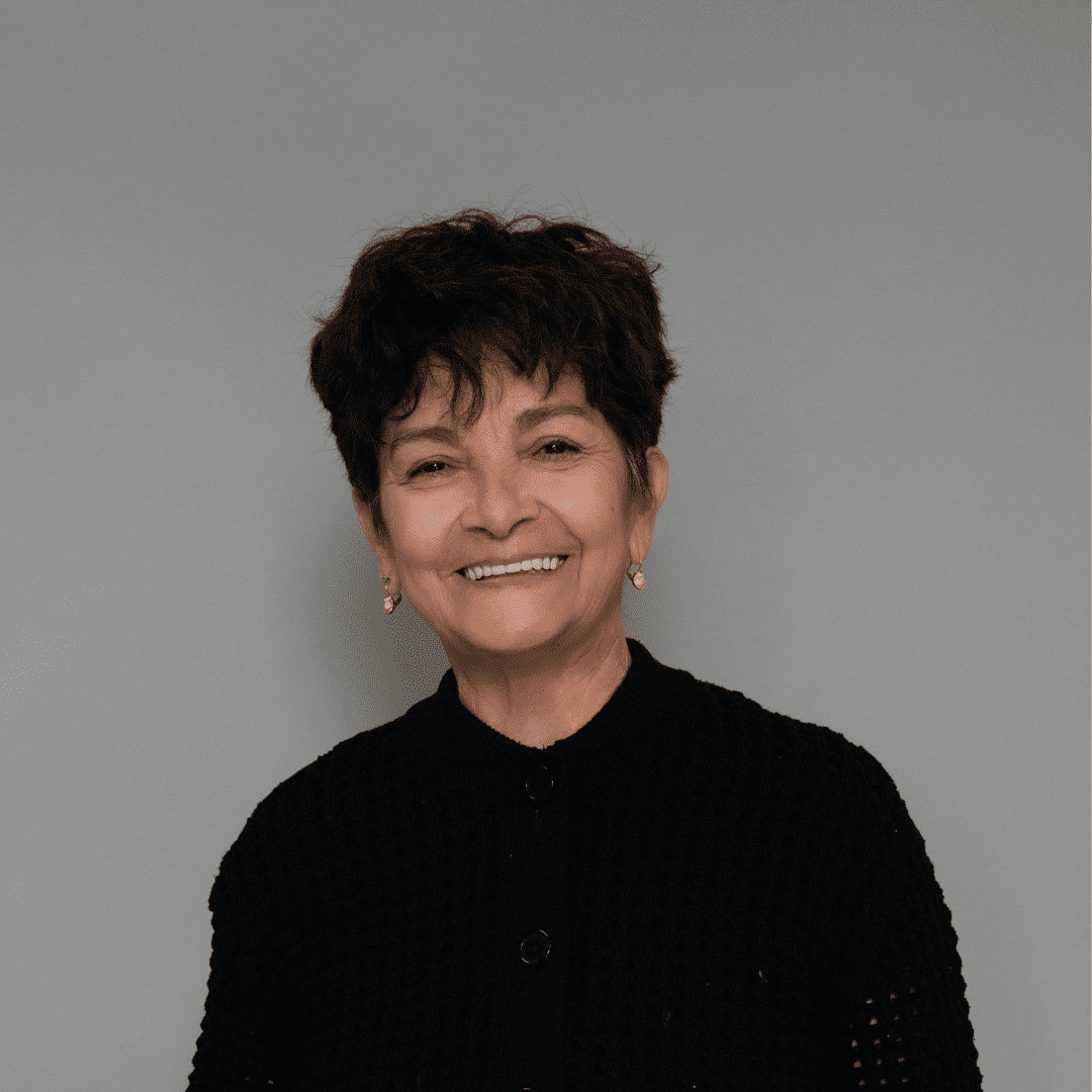 Portrait of Maria T., a professional stylist at The Changing Room Salon, showcasing their expertise and style.