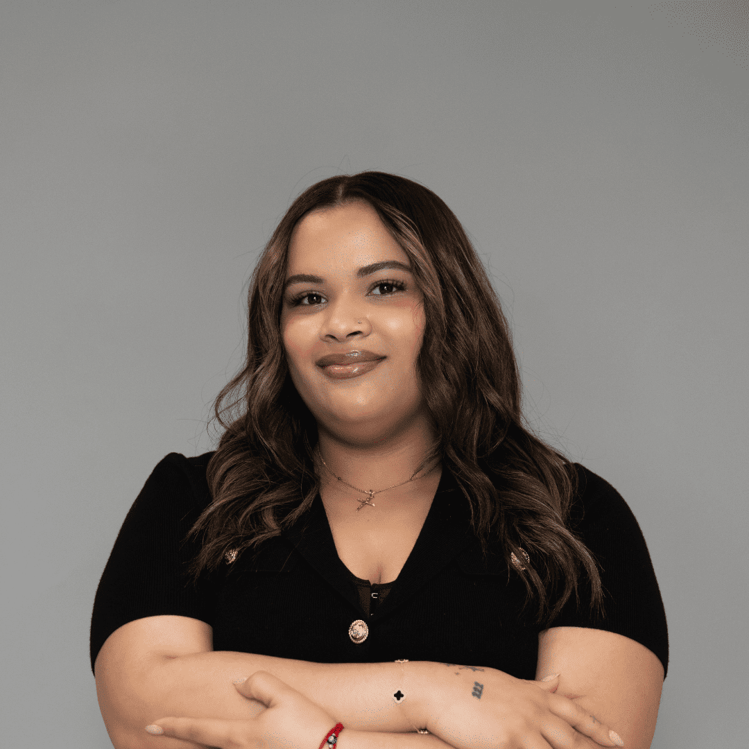 Portrait of Krismell F., a professional stylist at The Changing Room Salon, showcasing their expertise and style.