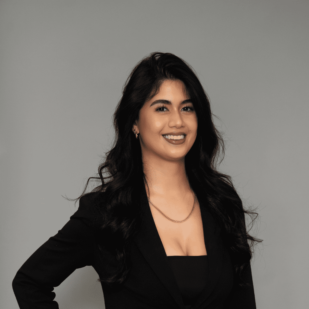 Portrait of Alejandra C., a professional stylist at The Changing Room Salon, showcasing their expertise and style.