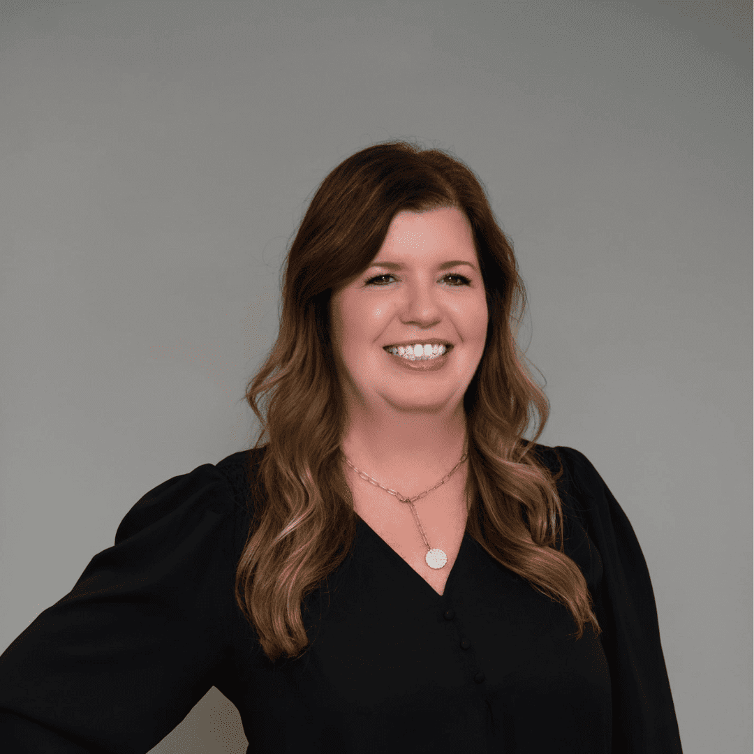 Portrait of Kimberly B., a professional stylist at The Changing Room Salon, showcasing their expertise and style.