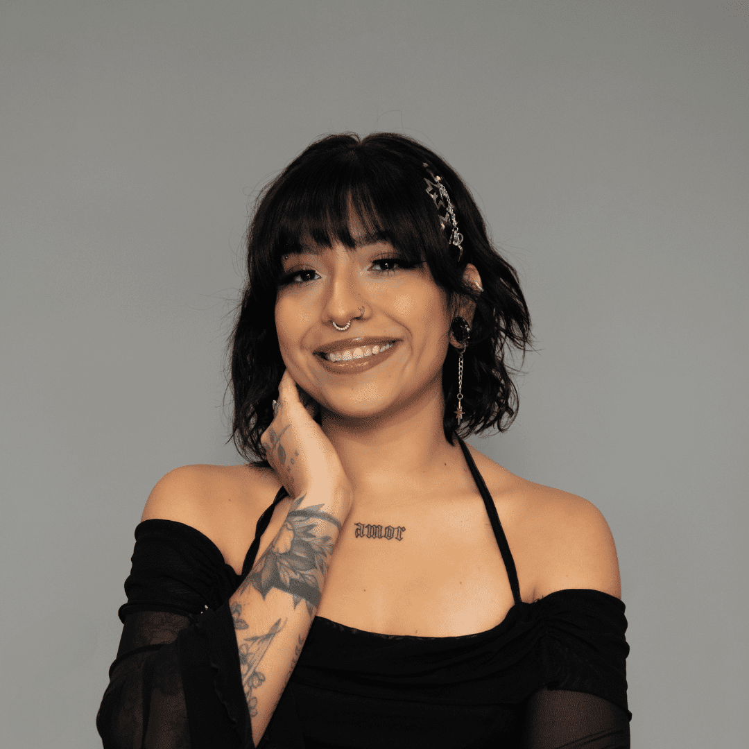 Portrait of Karla R., a professional stylist at The Changing Room Salon, showcasing their expertise and style.