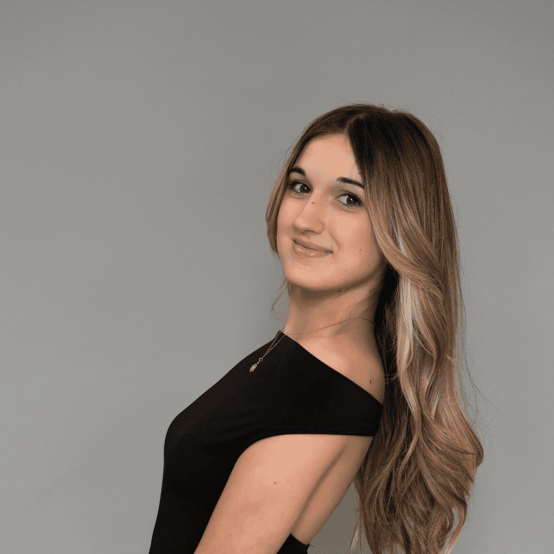 Portrait of Callie B., a professional stylist at The Changing Room Salon, showcasing their expertise and style.