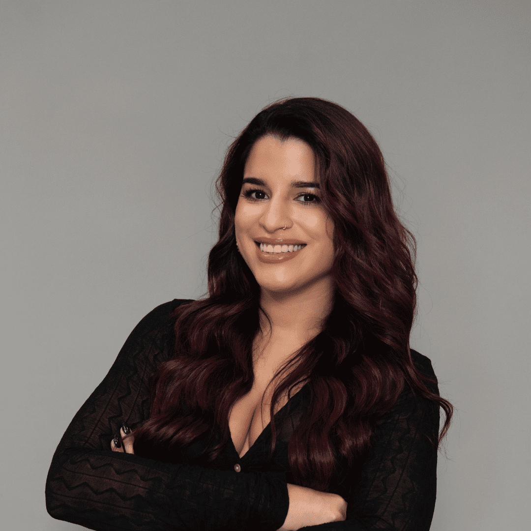 Portrait of Adara A., a professional stylist at The Changing Room Salon, showcasing their expertise and style.