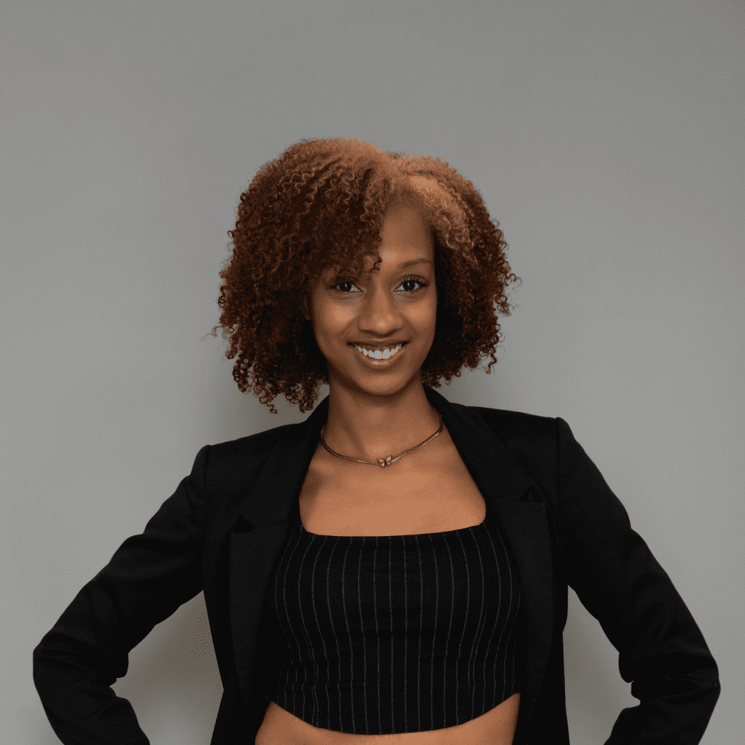 Portrait of Leah C., a professional stylist at The Changing Room Salon, showcasing their expertise and style.