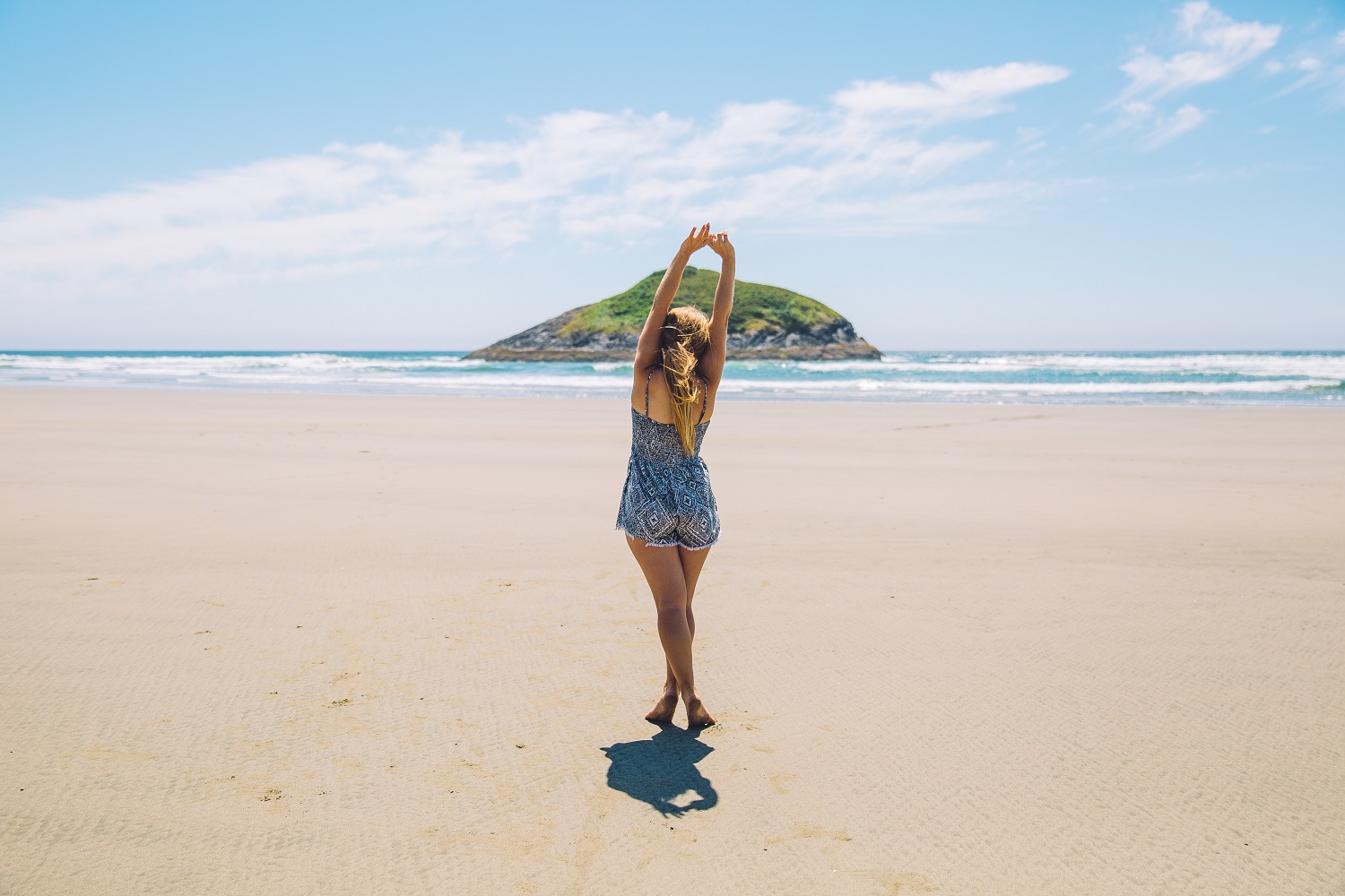 Woman posing in the beach